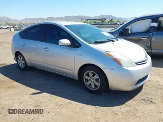 2007 Toyota Prius z VIN JTDKB20U077592065, wystawiony jako IAAI lot #42228840 z przebiegiem 187 566 mil mil oraz . Historia ofert i sprzedaży dostępna na DreamBid. Obrazek 1.