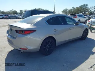 2023 Mazda 3 Premium Plus with VIN 3MZBPBEY3PM385377, listed as a IAAI auction lot 41478593 with 10,924 mi miles and . Bid and sale history available at DreamBid. Image 4.