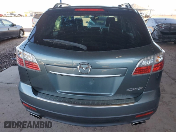 2012 Mazda CX-9 Grand Touring z VIN JM3TB2DA6C0348788, wystawiony jako Copart lot #52444915 z przebiegiem 130 392 mil mil oraz Szkoda całkowita • Salvage title. Historia ofert i sprzedaży dostępna na DreamBid. Obrazek 6.