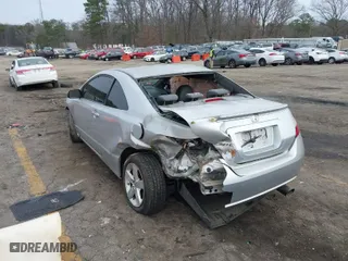 2008 Honda Civic Cpe EX-L with VIN 2HGFG12938H546744, listed as a IAAI auction lot 41526059 with 232,981 mi miles. Bid and sale history available at carsss.com. Image 3.