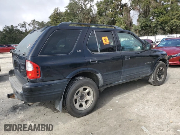 2001 Isuzu Rodeo S with VIN 4S2CK58W214338866, listed as a Copart auction lot 85280494 with 57,279 mi miles and Clean title. Bid and sale history available at DreamBid. Image 3.