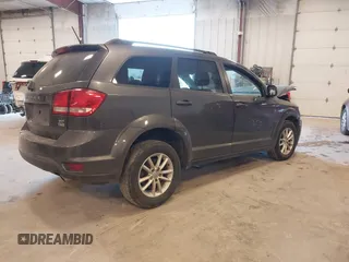 2017 Dodge Journey SXT z VIN 3C4PDCBGXHT534121, wystawiony jako IAAI lot #42145689 z przebiegiem 201 527 mil mil oraz . Historia ofert i sprzedaży dostępna na DreamBid. Obrazek 4.