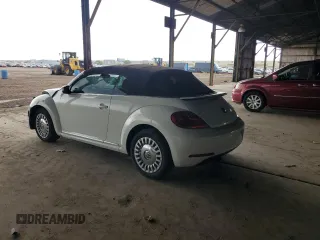 2013 Volkswagen Beetle 2.5L with VIN 3VW5P7AT2DM811768, listed as a Copart auction lot 55799135 with 60,505 mi miles and Salvage Title. Bid and sale history available at DreamBid. Image 2.