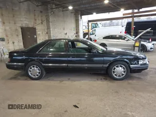 1997 Cadillac Seville Luxury SLS with VIN 1G6KS52YXVU816736, listed as a IAAI auction lot 41854220 with 107,091 mi miles. Bid and sale history available at carsss.com. Image 13.