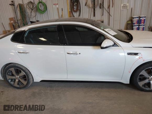 2018 Kia Optima SX with VIN 5XXGW4L27JG237960, listed as a IAAI auction lot 41956461 with 87,085 mi miles and . Bid and sale history available at DreamBid. Image 13.