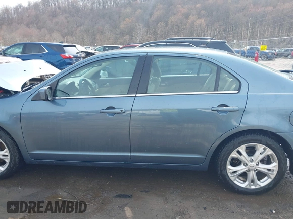 2012 Ford Fusion SE z VIN 3FAHP0HA7CR424958, wystawiony jako IAAI lot #41922636 z przebiegiem 101 149 mil mil oraz . Historia ofert i sprzedaży dostępna na DreamBid. Obrazek 15.