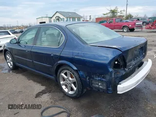 2003 Nissan Maxima GLE z VIN JN1DA31A03T412514, wystawiony jako IAAI lot #41856102 z przebiegiem 156 832 mil mil oraz . Historia ofert i sprzedaży dostępna na DreamBid. Obrazek 3.