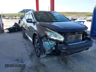 2015 Nissan Murano Platinum z VIN 5N1AZ2MG6FN226550, wystawiony jako IAAI lot #41510789 z przebiegiem 128 941 mil mil oraz . Historia ofert i sprzedaży dostępna na DreamBid. Obrazek 1.