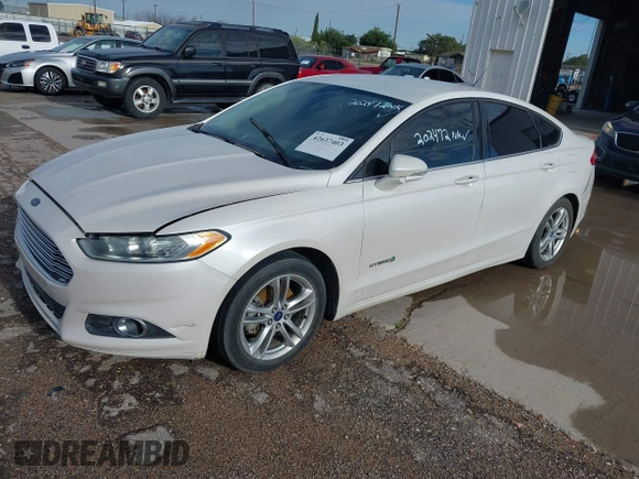2016 Ford Fusion SE Hybrid z VIN 3FA6P0LU2GR202472, wystawiony jako IAAI lot #42637403 z przebiegiem Nie podano mil oraz . Historia ofert i sprzedaży dostępna na DreamBid. Obrazek 2.