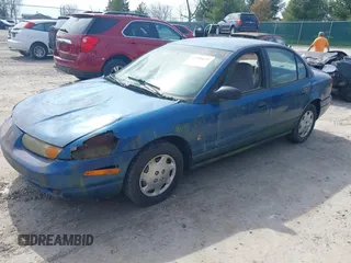2002 Saturn SL z VIN 1G8ZG52822Z132267, wystawiony jako IAAI lot #41906634 z przebiegiem 144 001 mil mil oraz . Historia ofert i sprzedaży dostępna na DreamBid. Obrazek 2.