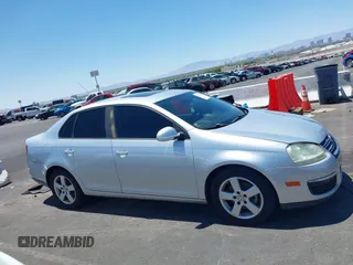 2008 Volkswagen Jetta S with VIN 3VWHM71K58M064797, listed as a IAAI auction lot 42676040 with 211,145 mi miles and . Bid and sale history available at DreamBid. Image 13.