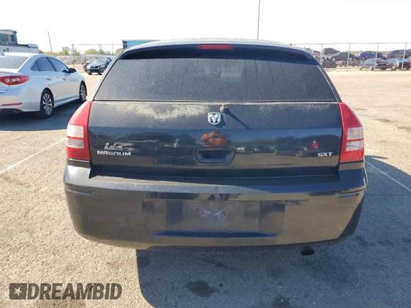 2005 Dodge Magnum SE z VIN 2D4FV48V55H533891, wystawiony jako Copart lot #74751644 z przebiegiem 287 869 mil mil oraz Szkoda całkowita • Salvage title. Historia ofert i sprzedaży dostępna na DreamBid. Obrazek 6.