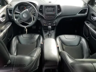 2021 Jeep Cherokee Altitude с VIN 1C4PJLLB5MD112348, выставлен на аукционе Copart как лот 59536115 с пробегом 129 897 миль миль и Списание • Salvage title. История ставок и продаж доступна на DreamBid. Изображение 8.