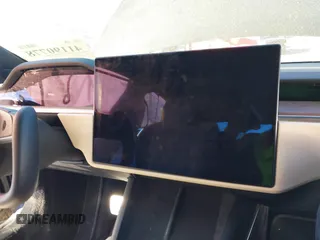 2021 Tesla Model S Long Range z VIN 5YJSA1E50MF438864, wystawiony jako IAAI lot #41190778 z przebiegiem Nie podano mil oraz . Historia ofert i sprzedaży dostępna na DreamBid. Obrazek 19.