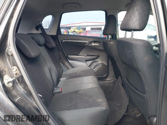 2015 Honda Fit LX with VIN 3HGGK5H50FM768011, listed as a IAAI auction lot 41499374 with 142,211 mi miles and . Bid and sale history available at DreamBid. Image 8.