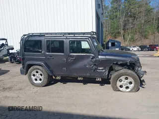 2014 Jeep Wrangler Unlimited Sahara с VIN 1C4BJWEG3EL267279, выставлен на аукционе IAAI как лот 42083836 с пробегом 81 796 миль миль и . История ставок и продаж доступна на DreamBid. Изображение 13.