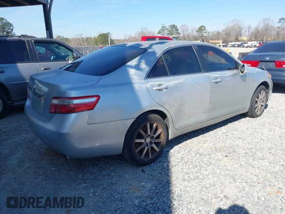 2007 Toyota Camry CE with VIN 4T1BE46K57U589118, listed as a IAAI auction lot 41693366 with 136,385 mi miles and . Bid and sale history available at DreamBid. Image 4.