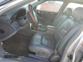 2002 Cadillac DeVille DTS with VIN 1G6KF57922U124813, listed as a Copart auction lot 87055984 with 94,769 mi miles and Salvage Title. Bid and sale history available at carsss.com. Image 7.