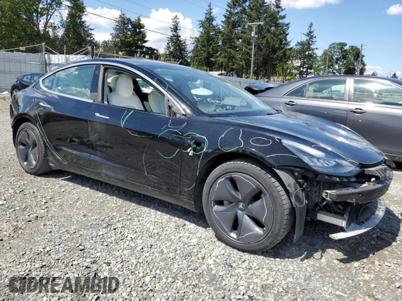 2020 Tesla Model 3 Long Range z VIN 5YJ3E1EBXLF795689, wystawiony jako Copart lot #56703555 z przebiegiem 62 556 mil mil oraz Szkoda całkowita • Salvage title. Historia ofert i sprzedaży dostępna na DreamBid. Obrazek 4.