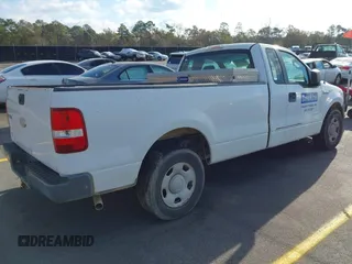 2007 Ford F-150 XL with VIN 1FTRF12W17NA26892, listed as a IAAI auction lot 41011688 with 158,088 mi miles. Bid and sale history available at carsss.com. Image 4.