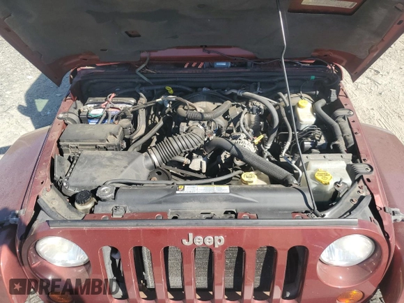 2010 Jeep Wrangler Sahara с VIN 1J4GA5D16AL225139, выставлен на аукционе Copart как лот 77114204 с пробегом Не указан миль и Списание • Salvage title. История ставок и продаж доступна на DreamBid. Изображение 12.