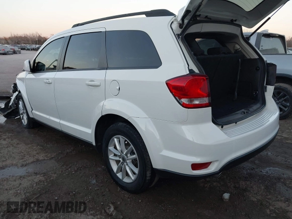 2018 Dodge Journey SXT with VIN 3C4PDCBG4JT514453, listed as a IAAI auction lot 41406727 with 121,235 mi miles. Bid and sale history available at carsss.com. Image 3.