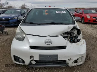 2012 Scion iQ with VIN JTNJJXB04CJ018325, listed as a Copart auction lot 49999945 with 91,507 mi miles and Salvage Title. Bid and sale history available at carsss.com. Image 5.