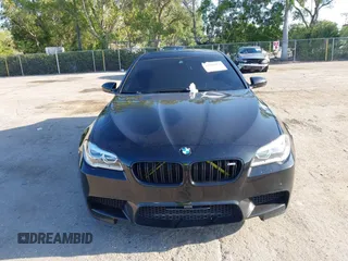 2014 BMW M5 z VIN WBSFV9C54ED593281, wystawiony jako IAAI lot #42063656 z przebiegiem 104 517 mil mil oraz . Historia ofert i sprzedaży dostępna na DreamBid. Obrazek 12.