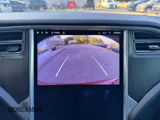 2013 Tesla Model S with VIN 5YJSA1CG5DFP18929, listed as a Copart auction lot 67245595 with 111,151 mi miles and Clean title. Bid and sale history available at DreamBid. Image 8.