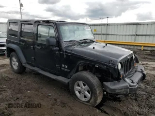 2008 Jeep Wrangler Unlimited X with VIN 1J4GA391X8L528349, listed as a Copart auction lot 57086935 with 134,061 mi miles and Salvage title. Bid and sale history available at DreamBid. Image 4.