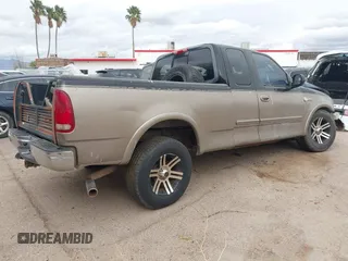 2003 Ford F-150 XL with VIN 1FTRX18LX3NB05434, listed as a IAAI auction lot 41799343 with 1 mi miles. Bid and sale history available at carsss.com. Image 4.