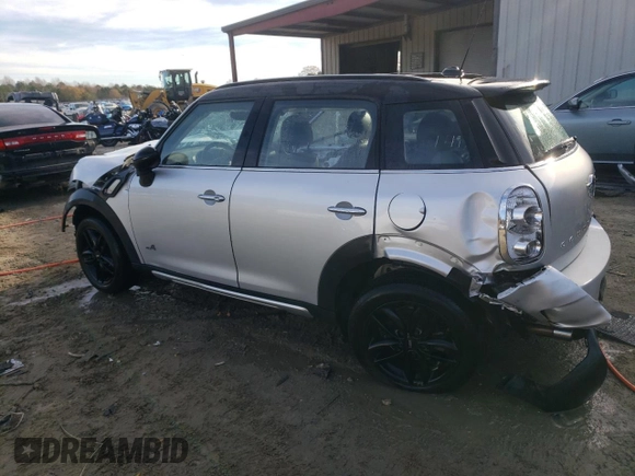 2016 MINI Countryman S with VIN WMWZC5C55GWU22112, listed as a Copart auction lot 82132654 with 60,210 mi miles and Salvage Title. Bid and sale history available at DreamBid. Image 2.
