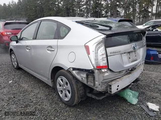 2013 Toyota Prius Plug-In with VIN JTDKN3DP0D3046032, listed as a IAAI auction lot 41471986 with 112,382 mi miles. Bid and sale history available at carsss.com. Image 3.