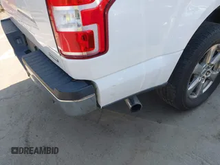 2019 Ford F-150 XL with VIN 1FTEW1C44KKC60773, listed as a IAAI auction lot 42706042 with 185,864 mi miles and . Bid and sale history available at DreamBid. Image 12.