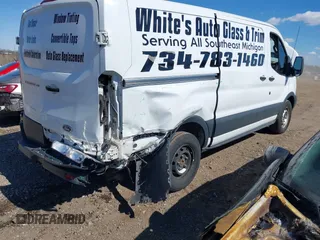 2017 Ford Transit with VIN 1FTYE1YM2HKB34459, listed as a IAAI auction lot 42059820 with 215,646 mi miles and . Bid and sale history available at DreamBid. Image 12.