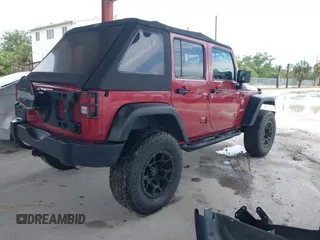 2012 Jeep Wrangler Unlimited Sport z VIN 1C4BJWDG3CL207291, wystawiony jako IAAI lot #42211454 z przebiegiem 110 864 mil mil oraz . Historia ofert i sprzedaży dostępna na DreamBid. Obrazek 4.