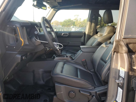 2024 Ford Bronco Badlands with VIN 1FMEE9BP4RLA21303, listed as a Copart auction lot 53457375 with 13,881 mi miles and Salvage title. Bid and sale history available at DreamBid. Image 7.