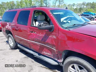 2011 GMC Yukon XL SLT with VIN 1GKS2KE37BR118843, listed as a IAAI auction lot 41983870 with 236,029 mi miles. Bid and sale history available at carsss.com. Image 6.