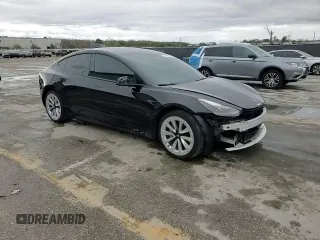 2022 Tesla Model 3 with VIN 5YJ3E1EA0NF186296, listed as a Copart auction lot 45711405 with 75,653 mi miles and Salvage Title. Bid and sale history available at DreamBid. Image 13.