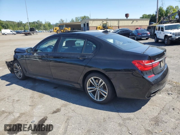2017 BMW 7 Series 740i xDrive with VIN WBA7E4C54HGU99710, listed as a Copart auction lot 69572544 with 0 mi miles and Salvage Title. Bid and sale history available at carsss.com. Image 2.