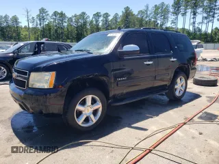 2011 Chevrolet Tahoe LS with VIN 1GNSCAE02BR131905, listed as a Copart auction lot 57707875 with 244,978 mi miles and Salvage title. Bid and sale history available at DreamBid. Image 1.