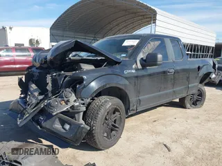 2016 Ford F-150 XL with VIN 1FTEX1C80GKD10379, listed as a IAAI auction lot 41313355 with 133,058 mi miles and . Bid and sale history available at carsss.com. Image 2.