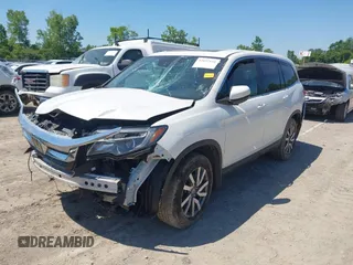 2021 Honda Pilot EX-L z VIN 5FNYF6H51MB058615, wystawiony jako IAAI lot #42657151 z przebiegiem 95 498 mil mil oraz . Historia ofert i sprzedaży dostępna na DreamBid. Obrazek 17.