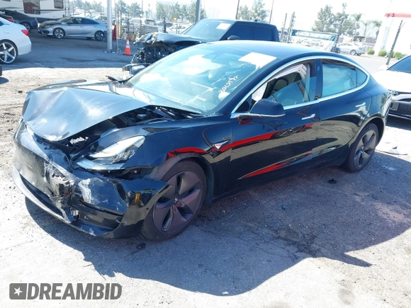 2018 Tesla Model 3 Long Range Battery with VIN 5YJ3E1EB9JF183920, listed as a IAAI auction lot 41657742 with 107,358 mi miles and . Bid and sale history available at DreamBid. Image 16.