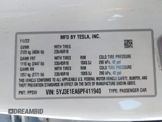 2023 Tesla Model 3 with VIN 5YJ3E1EA6PF411940, listed as a IAAI auction lot 41829537 with 32,877 mi miles and . Bid and sale history available at carsss.com. Image 9.