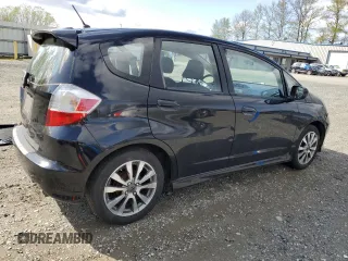 2012 Honda Fit Sport with VIN JHMGE8H58CC013885, listed as a Copart auction lot 53052205 with 144,182 mi miles and Salvage Title. Bid and sale history available at carsss.com. Image 3.