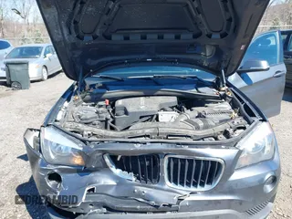 2015 BMW X1 xDrive28i with VIN WBAVL1C59FVY25442, listed as a IAAI auction lot 41854794 with 98,432 mi miles. Bid and sale history available at carsss.com. Image 10.