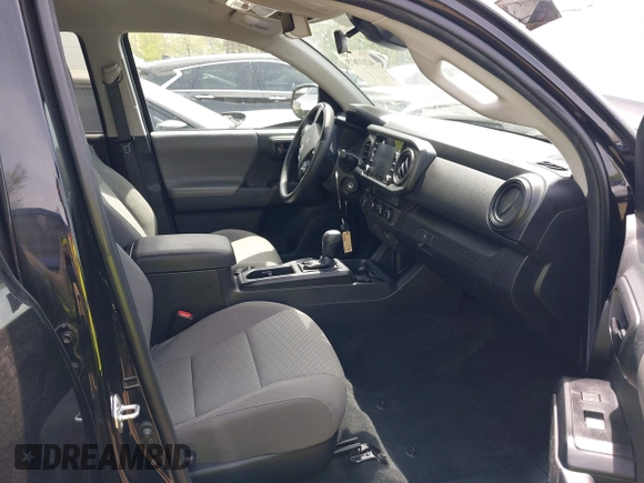 2022 Toyota Tacoma SR with VIN 3TYCZ5AN0NT074683, listed as a IAAI auction lot 42117875 with 51,112 mi miles and . Bid and sale history available at DreamBid. Image 5.