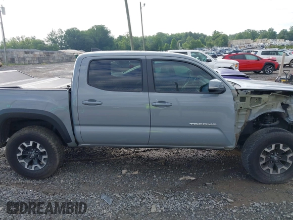 2021 Toyota Tacoma SR with VIN 5TFCZ5AN7MX255512, listed as a IAAI auction lot 42497907 with 50,563 mi miles and . Bid and sale history available at DreamBid. Image 14.