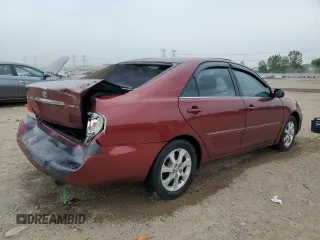 2005 Toyota Camry LE with VIN 4T1BE30KX5U086586, listed as a Copart auction lot 60291715 with 180,421 mi miles and Salvage title. Bid and sale history available at DreamBid. Image 3.